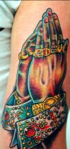 Hands prayer religious tattoo