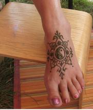 Pretty foot henna tattoo looking cool.JPG