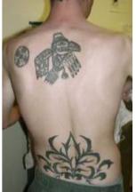 Up and low back tattoo photos.JPG