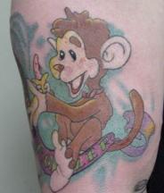 Cartoonish Monkey tattoo images.JPG