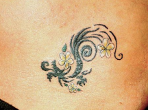 Hawaiian dragon tattoo with flowers.PNG