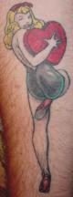 Girl with a heart tattoo