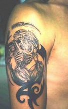 Metal alien tattoo images.PNG
