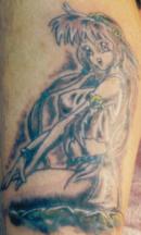 Tattoo of a scared girl