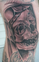 Skulll tattoo looking so scary.PNG