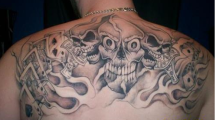 Tattoo casino skulls in the upper back.PNG