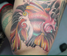 Gold fish tattoo pics.PNG