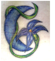 Picture of moon tattoo with flower.PNG