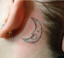 Moon tattoo behind the ear.PNG