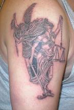 justice tatttoo.jpg