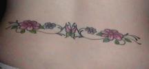 Butterfly with flowers tattoo