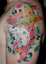 Swimming fish tattoo