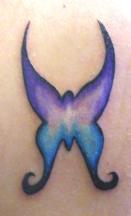 Blue and purple butterfly tattoo