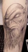devil tattoo with long hair