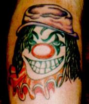 evil clown tattoo with hat