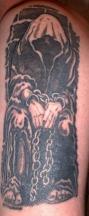 evil man tattoo in black