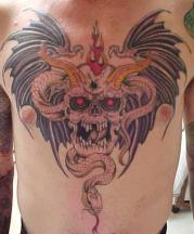 evil skull tattoo with wings