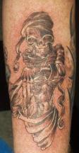 evil skull tattoo