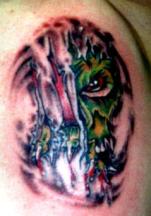 green demon tattoo