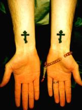 Cross Tattoo on wrists