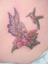 Fairy with bird tattoo