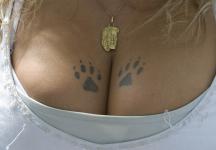Cat paws tattos on breasts.jpg