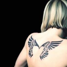 Geometric Angel wings tattoo.jpg