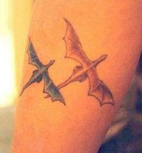 Dragon mating flight tattoo