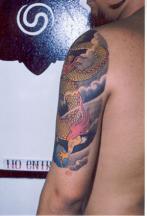 Red and black dragon tattoo