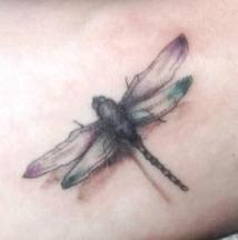 Flying bug tattoo