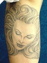 Lady face tattoo