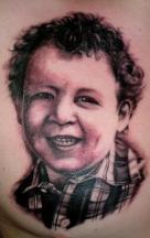 Tattoo of a little boy