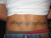 tribal tattoo on lower back design.jpg