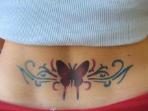 butterfly tattoo on lower back.jpg