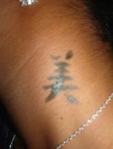 awesome Chinese Symbol tattoo.jpg