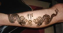 Asian character tattoo with dragons.jpg