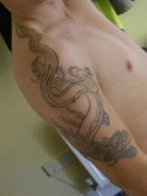 light ink tattoo of dragon.jpg