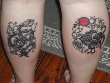 symbol tattoos on legs.jpg