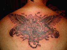 flying tiger with wings tattoo.jpg
