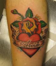 heart with roses tattoo.jpg