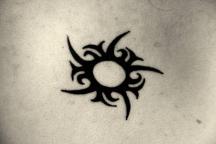 image of tribal sun tattoo.jpg