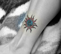 sun tattoo on fire.jpg