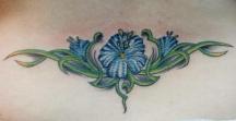 Blue flowers tattoo