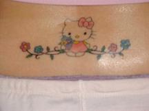 Hello Kitty tattoo on the lower back image