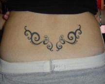 cool tattoo on lower back image