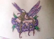 fair tattoo on lower back