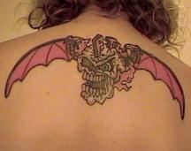flying skull tatttoo.jpg