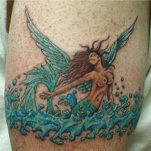 Mermaid armband tattoo pics.jpg