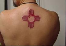 Red Native America symbol on the upper back.jpg
