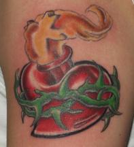 Heart with smoking of cross tattoo